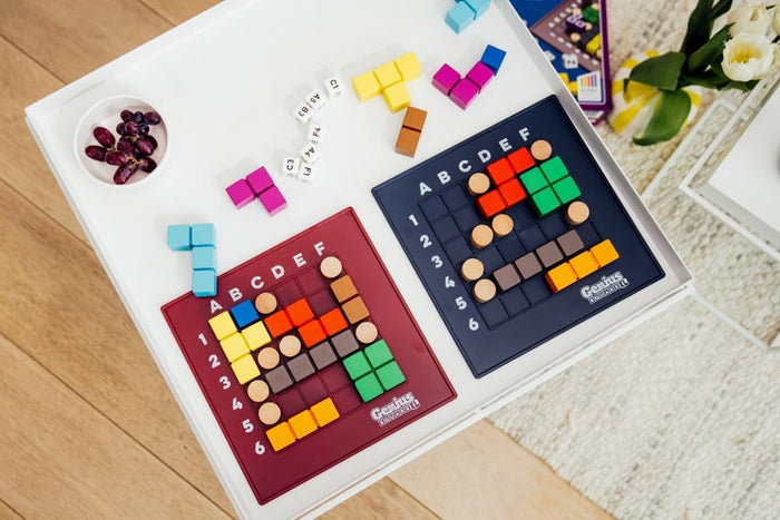 Educational toy with colorful blocks and number tiles on a wooden surface.
