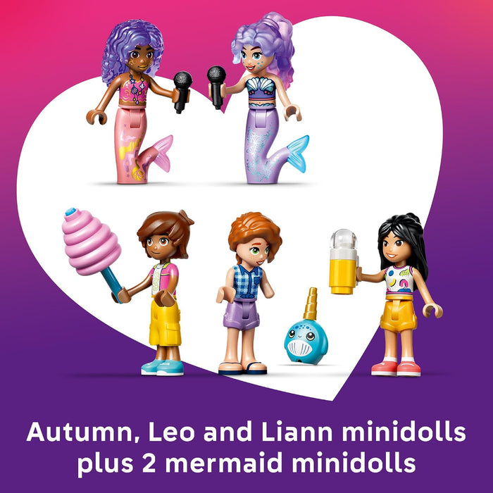 Toy minidolls including mermaids and other characters on a heart-shaped background