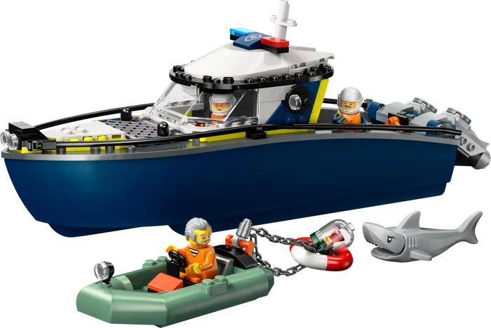 Toy boat set with a shark and small boat on a white background
